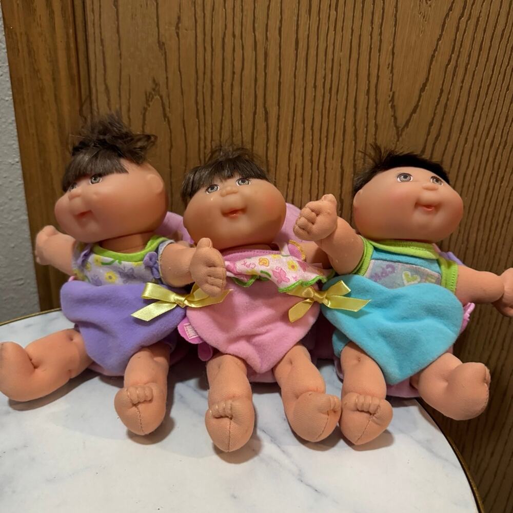 Cabbage Patch kids triplets with pack 1995
